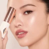 Charlotte Tilbury UNREAL SKIN SHEER GLOW TINT HYDRATING FOUNDATION STICK 1 FAIR - Image 3
